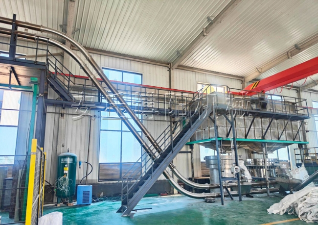 東營碳酸鈣粉管鏈輸送機、管鏈式粉體投料機應(yīng)用
